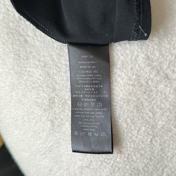 Anne Fontaine Sully black short sleeve top with mini polka dots and ruffles. - Picture 8 of 8